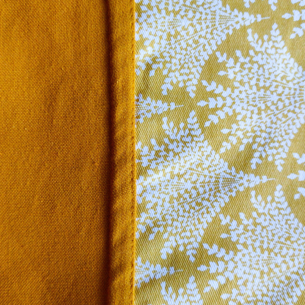Mustard yellow foliage print bedspread