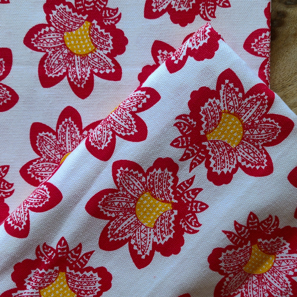 Red floral print bedspread