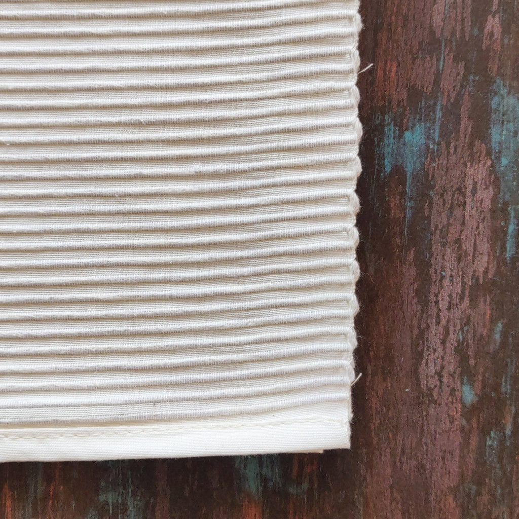 White ribbed cotton placemats & napkins