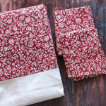 Red and white floral print king size bedspread